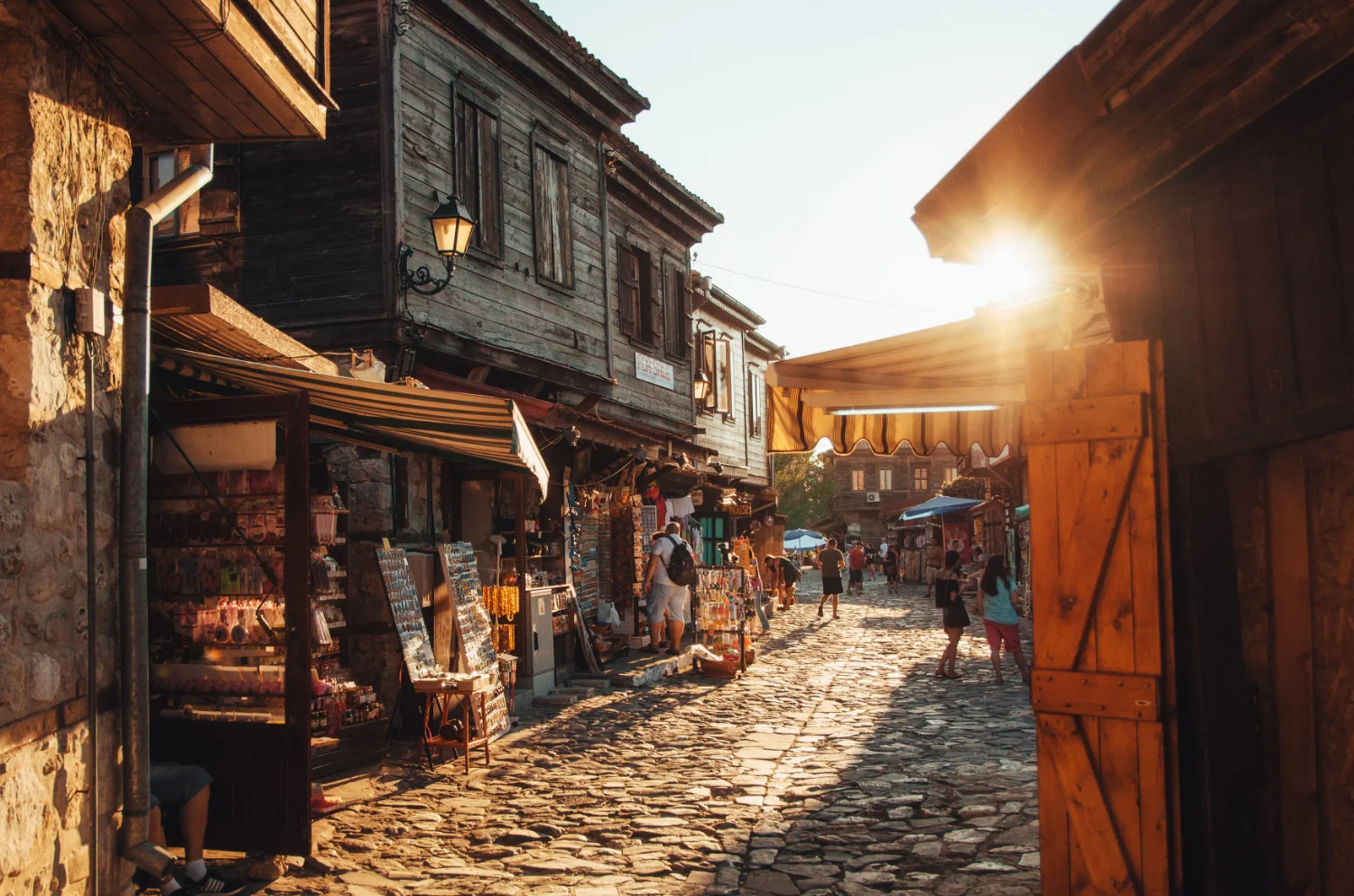 People walking on cobblestone streets in Nessebar on the Black Sea coast